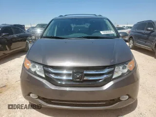 2015 Honda Odyssey Touring Elite z VIN 5FNRL5H97FB002739, wystawiony jako Copart lot #62060695 z przebiegiem 194 604 mil mil oraz Szkoda całkowita • Salvage title. Historia ofert i sprzedaży dostępna na DreamBid. Obrazek 5.