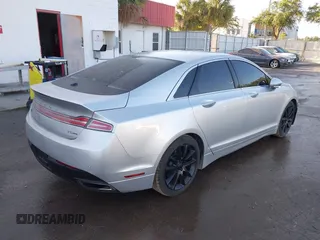 2014 Lincoln MKZ with VIN 3LN6L2G99ER808853, listed as a IAAI auction lot 42157083 with 157,696 mi miles. Bid and sale history available at carsss.com. Image 4.