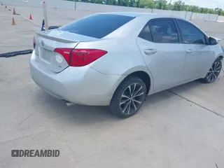 2017 Toyota Corolla L z VIN 5YFBURHE4HP732912, wystawiony jako IAAI lot #42451597 z przebiegiem 73 901 mil mil oraz . Historia ofert i sprzedaży dostępna na DreamBid. Obrazek 4.