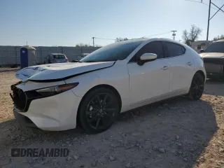 2019 Mazda Mazda3 Hatchback w/Premium Pkg with VIN JM1BPBNM2K1144965, listed as a Copart auction lot 83265804 with 85,230 mi miles and Salvage Title. Bid and sale history available at carsss.com. Image 1.