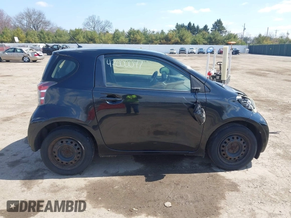 2012 Scion iQ with VIN JTNJJXB03CJ018302, listed as a IAAI auction lot 42000097 with 191,918 mi miles. Bid and sale history available at carsss.com. Image 14.