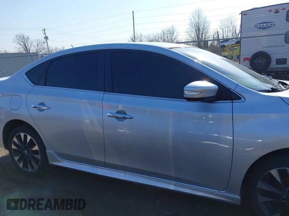 2018 Nissan Sentra S with VIN 3N1AB7AP1JY217456, listed as a IAAI auction lot 41647997 with 141,179 mi miles and . Bid and sale history available at DreamBid. Image 14.