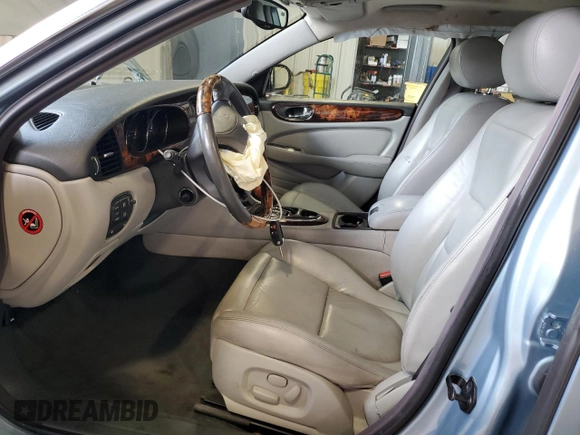 2004 Jaguar XJ with VIN SAJWA71C34SG29145, listed as a Copart auction lot 45932635 with 133,888 mi miles and Salvage Title. Bid and sale history available at carsss.com. Image 7.