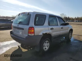 2002 Ford Escape XLS Choice with VIN 1FMYU02162KB03729, listed as a Copart auction lot 53274675 with 150,360 mi miles and Salvage title. Bid and sale history available at DreamBid. Image 3.