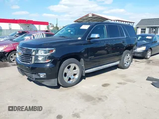 2015 Chevrolet Tahoe LTZ z VIN 1GNSKCKC3FR104845, wystawiony jako IAAI lot #42291785 z przebiegiem 75 047 mil mil oraz . Historia ofert i sprzedaży dostępna na DreamBid. Obrazek 20.