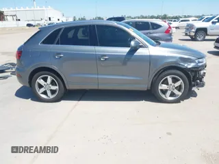 2015 Audi Q3 Prestige with VIN WA1GFCFS7FR013818, listed as a IAAI auction lot 41975076 with 60,295 mi miles and . Bid and sale history available at DreamBid. Image 14.