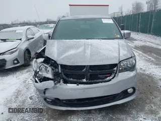 2018 Dodge Grand Caravan SE Plus with VIN 2C4RDGBG2JR254945, listed as a IAAI auction lot 41716809 with 99,404 mi miles and . Bid and sale history available at DreamBid. Image 12.