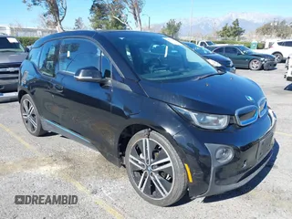 2017 BMW i3 z VIN WBY1Z8C59HV889443, wystawiony jako IAAI lot #41383502 z przebiegiem 106 853 mil mil oraz . Historia ofert i sprzedaży dostępna na DreamBid. Obrazek 1.