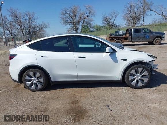 2021 Tesla Model Y Long Range with VIN 5YJYGDEE4MF122362, listed as a IAAI auction lot 42096138 with 47,006 mi miles and . Bid and sale history available at DreamBid. Image 14.