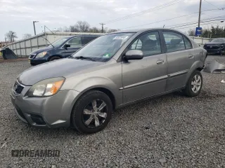 2011 Kia Rio LX with VIN KNADH4A34B6911228, listed as a Copart auction lot 53022695 with 114,686 mi miles and Salvage Title. Bid and sale history available at carsss.com. Image 1.