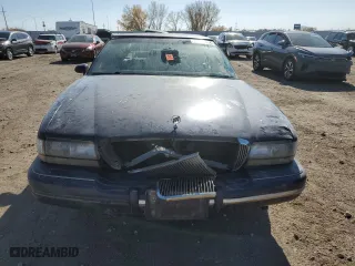 1996 Buick Park Avenue with VIN 1G4CW52KXTH613655, listed as a Copart auction lot 77555014 with 211,212 mi miles and Salvage Title. Bid and sale history available at carsss.com. Image 5.