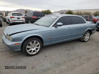 2005 Jaguar XJ with VIN SAJWA79CX5SG35319, listed as a Copart auction lot 49321465 with 182,834 mi miles and Salvage Title. Bid and sale history available at carsss.com. Image 1.