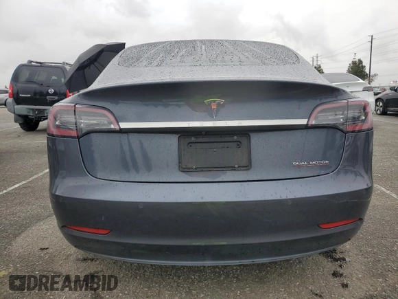 2019 Tesla Model 3 Mid Range with VIN 5YJ3E1EA9KF447453, listed as a Copart auction lot 48967605 with 72,031 mi miles and Salvage Title. Bid and sale history available at DreamBid. Image 6.