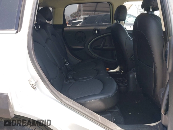 2016 MINI Countryman S with VIN WMWZC3C51GWT10248, listed as a IAAI auction lot 42359191 with 77,157 mi miles and . Bid and sale history available at DreamBid. Image 8.