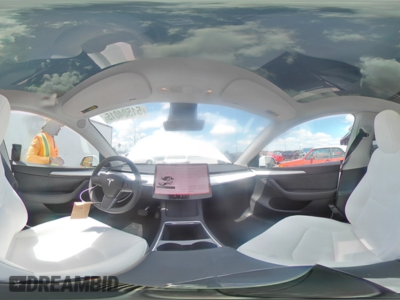 2025 Tesla Model Y Long Range with VIN 7SAYGDED4SF232433, listed as a Copart auction lot 51504015 with Not Provided miles and Salvage Title. Bid and sale history available at DreamBid. Image 16.