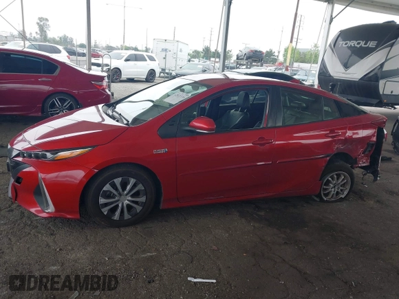 2021 Toyota Prius LE with VIN JTDKAMFP6M3189145, listed as a IAAI auction lot 42021116 with 80,722 mi miles and . Bid and sale history available at DreamBid. Image 14.