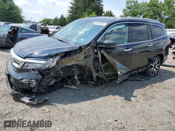 2020 Honda Pilot Touring 8-Passenger with VIN 5FNYF5H95LB021658, listed as a Copart auction lot 58878594 with 36,122 mi miles and Salvage Title. Bid and sale history available at DreamBid. Image 1.