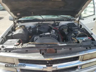 1999 Chevrolet Suburban with VIN 3GNEC16R5XG213001, listed as a Copart auction lot 43498865 with 236,306 mi miles and Salvage Title. Bid and sale history available at carsss.com. Image 12.