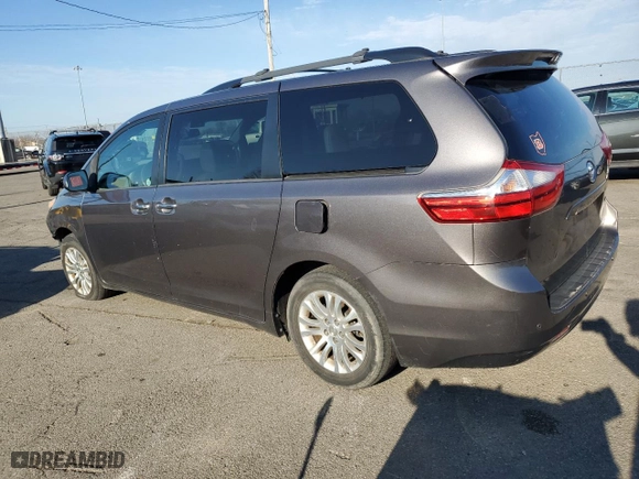 2015 Toyota Sienna XLE with VIN 5TDYK3DC7FS583580, listed as a Copart auction lot 50762745 with 185,684 mi miles and Clean Title. Bid and sale history available at carsss.com. Image 2.