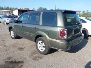 2006 Honda Pilot LX with VIN 5FNYF28156B040336, listed as a IAAI auction lot 42223190 with 158,686 mi miles and . Bid and sale history available at DreamBid. Image 3.