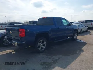 2015 Chevrolet Silverado 1500 LT with VIN 1GCRCREC2FZ297041, listed as a IAAI auction lot 41563446 with 186,163 mi miles. Bid and sale history available at carsss.com. Image 4.