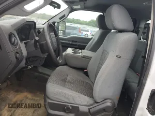 2014 Ford F-250 XLT with VIN 1FT7X2A65EEA98638, listed as a Copart auction lot 60948084 with 319,812 mi miles and Salvage title. Bid and sale history available at DreamBid. Image 7.