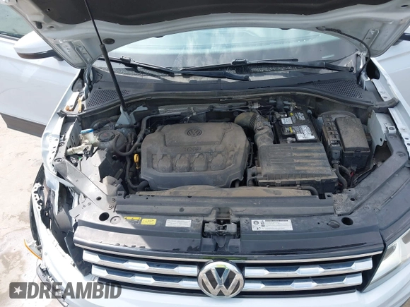 2018 Volkswagen Tiguan S with VIN 3VV1B7AX0JM092116, listed as a IAAI auction lot 42388339 with 103,412 mi miles and . Bid and sale history available at DreamBid. Image 10.