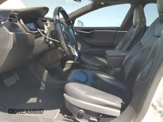 2014 Tesla Model S 60 with VIN 5YJSA1H19EFP58677, listed as a Copart auction lot 61446345 with 150,152 mi miles and Salvage title. Bid and sale history available at DreamBid. Image 7.