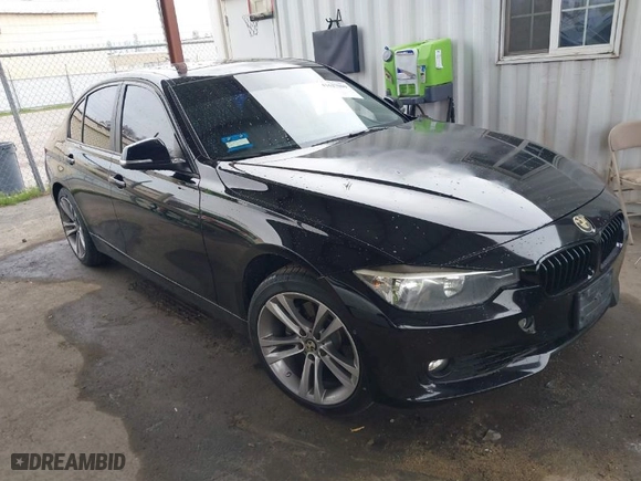 2015 BMW 3 Series 328i with VIN WBA3A5G53FNS89800, listed as a IAAI auction lot 41627009 with 122,413 mi miles. Bid and sale history available at carsss.com. Image 1.