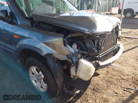 2006 Honda Pilot LX with VIN 2HKYF18156H542940, listed as a IAAI auction lot 41653949 with 152,321 mi miles and . Bid and sale history available at DreamBid. Image 18.