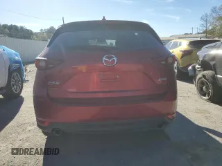 2018 Mazda CX-5 Grand Touring with VIN JM3KFADM1J1454982, listed as a Copart auction lot 49162495 with 109,559 mi miles and Salvage Title. Bid and sale history available at DreamBid. Image 6.