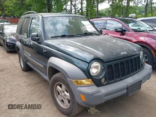 2005 Jeep Liberty Sport with VIN 1J4GL48K15W557730, listed as a IAAI auction lot 42214736 with 182,045 mi miles. Bid and sale history available at carsss.com. Image 1.