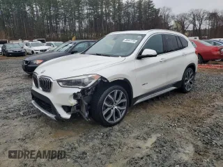 2017 BMW X1 xDrive28i with VIN WBXHT3C38H5F70088, listed as a Copart auction lot 50447715 with 119,649 mi miles and Clean Title. Bid and sale history available at carsss.com. Image 1.