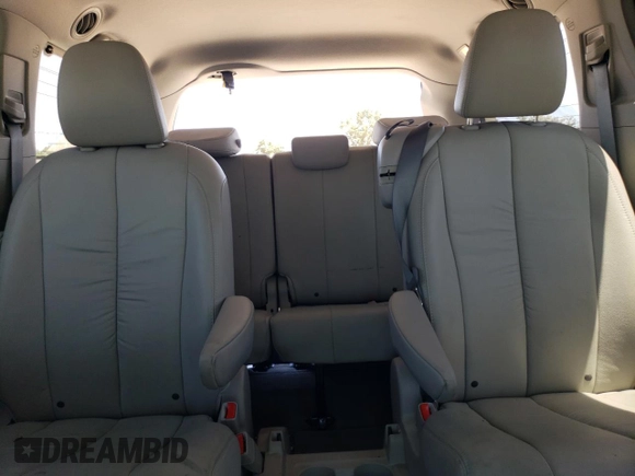 2012 Toyota Sienna XLE AAS z VIN 5TDYK3DC5CS209528, wystawiony jako Copart lot #60453395 z przebiegiem 166 320 mil mil oraz Szkoda całkowita • Salvage title. Historia ofert i sprzedaży dostępna na DreamBid. Obrazek 10.