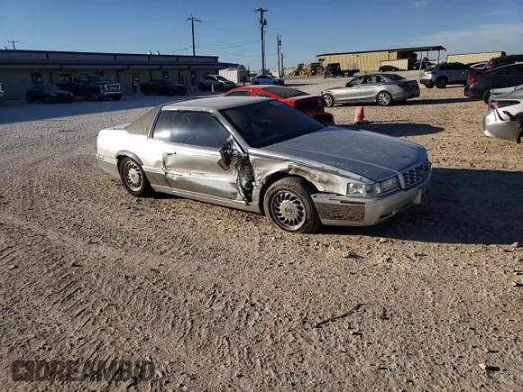 2000 Cadillac Eldorado Touring with VIN 1G6ET1295YU145248, listed as a Copart auction lot 82160574 with 87,294 mi miles and Salvage Title. Bid and sale history available at DreamBid. Image 11.