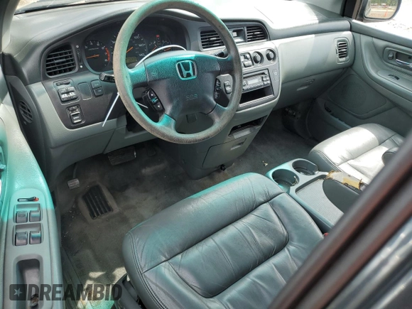 2003 Honda Odyssey EX-L with VIN 5FNRL18933B116127, listed as a Copart auction lot 56013645 with 157,118 mi miles and Salvage Title. Bid and sale history available at DreamBid. Image 8.