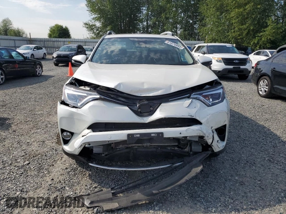 2016 Toyota RAV4 Limited with VIN JTMDFREV9GJ066429, listed as a Copart auction lot 61874995 with 77,686 mi miles and Salvage title. Bid and sale history available at DreamBid. Image 5.