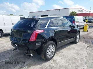 2017 Cadillac XT5 FWD with VIN 1GYKNARS6HZ123114, listed as a IAAI auction lot 41933928 with 166,213 mi miles. Bid and sale history available at carsss.com. Image 4.
