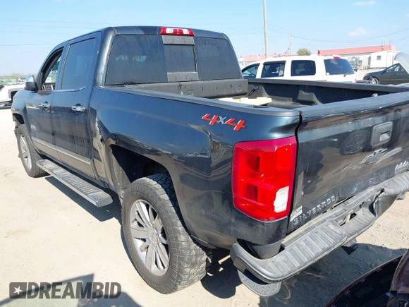 2018 Chevrolet Silverado 1500 High Country with VIN 3GCUKTEC8JG308353, listed as a IAAI auction lot 40714183 with 88,711 mi miles and . Bid and sale history available at DreamBid. Image 3.