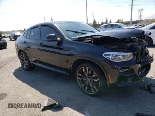 2021 BMW X4 M40i with VIN 5UX2V5C01M9F81840, listed as a Copart auction lot 56868653 with 0 mi miles. Bid and sale history available at carsss.com. Image 4.