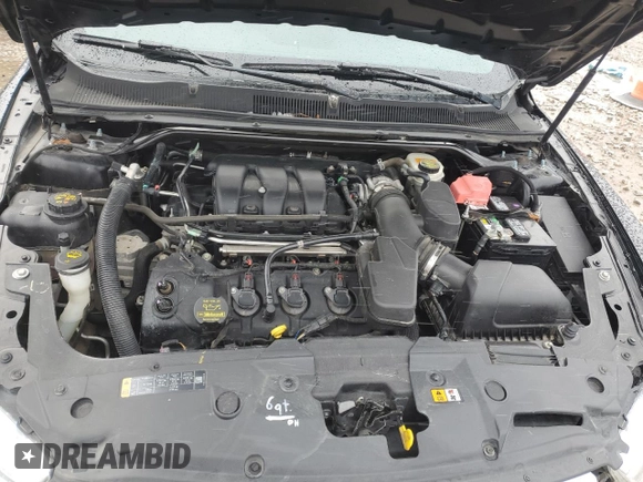 2013 Ford Taurus Limited z VIN 1FAHP2F80DG216618, wystawiony jako Copart lot #85572994 z przebiegiem 185 697 mil mil oraz Szkoda całkowita • Salvage title. Historia ofert i sprzedaży dostępna na DreamBid. Obrazek 11.