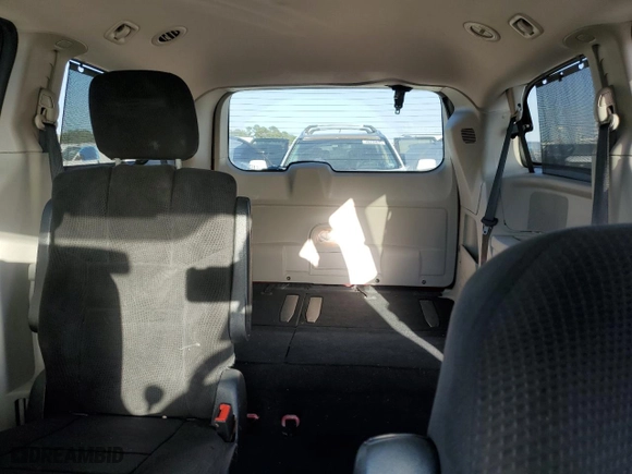 2013 Dodge Grand Caravan SXT with VIN 2C4RDGCG5DR538878, listed as a Copart auction lot 48061255 with 129,993 mi miles and Salvage Title. Bid and sale history available at carsss.com. Image 10.