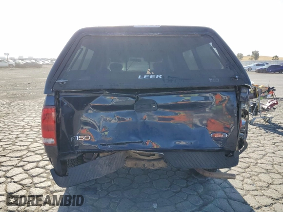 2003 Ford F-150 XL z VIN 2FTRX17W63CA80033, wystawiony jako Copart lot #58432895 z przebiegiem 111 133 mil mil oraz Szkoda całkowita • Salvage title. Historia ofert i sprzedaży dostępna na DreamBid. Obrazek 6.