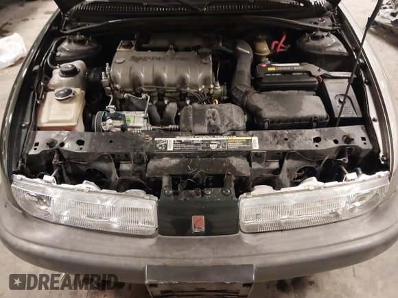 1997 Saturn SL with VIN 1G8ZH5280VZ172929, listed as a IAAI auction lot 41273214 with 134,972 mi miles. Bid and sale history available at carsss.com. Image 10.