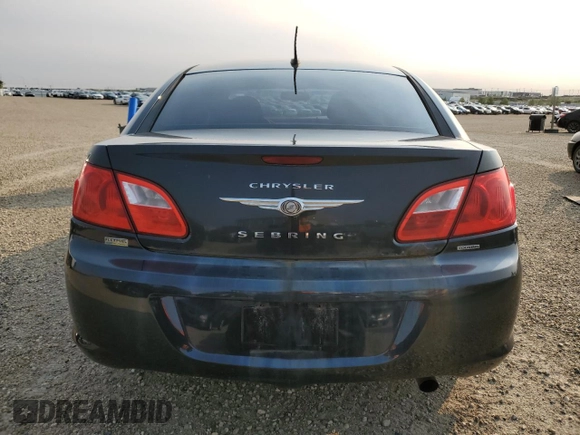 2009 Chrysler Sebring Touring z VIN 1C3LC56D69N531168, wystawiony jako Copart lot #59331415 z przebiegiem 225 463 mil mil oraz Szkoda całkowita • Salvage title. Historia ofert i sprzedaży dostępna na DreamBid. Obrazek 6.