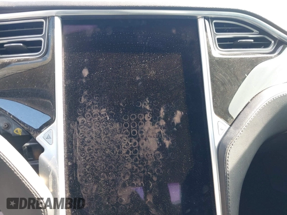 2014 Tesla Model S 60 z VIN 5YJSA1H17EFP43546, wystawiony jako IAAI lot #41896443 z przebiegiem Nie podano mil oraz . Historia ofert i sprzedaży dostępna na DreamBid. Obrazek 7.