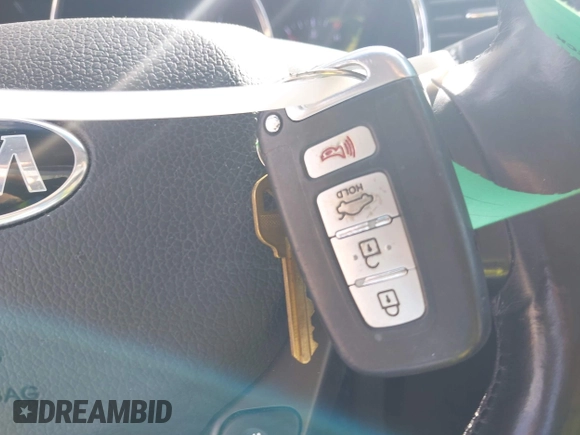 2013 Kia Optima EX with VIN 5XXGN4A79DG105157, listed as a IAAI auction lot 42496945 with 119,000 mi miles and . Bid and sale history available at DreamBid. Image 11.