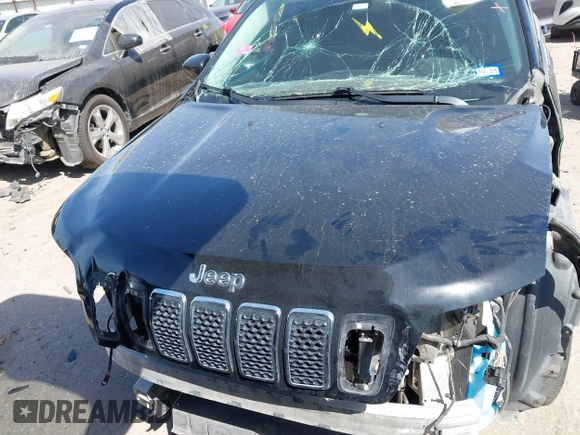 2019 Jeep Cherokee Latitude Plus with VIN 1C4PJLLB0KD358852, listed as a IAAI auction lot 41794999 with 112,667 mi miles. Bid and sale history available at carsss.com. Image 13.