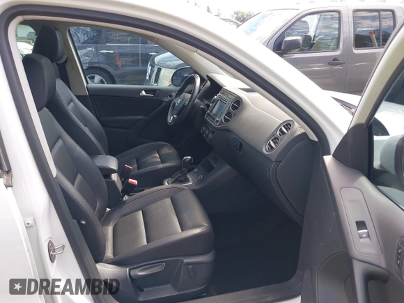 2016 Volkswagen Tiguan S with VIN WVGBV7AXXGW580052, listed as a IAAI auction lot 41444015 with 102,165 mi miles and . Bid and sale history available at DreamBid. Image 5.