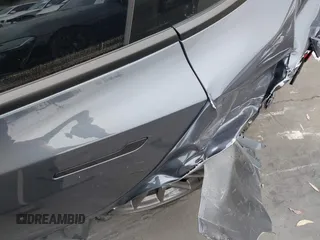 2023 Tesla Model 3 z VIN 5YJ3E1EAXPF403095, wystawiony jako IAAI lot #42151764 z przebiegiem 17 872 mil mil oraz . Historia ofert i sprzedaży dostępna na DreamBid. Obrazek 19.